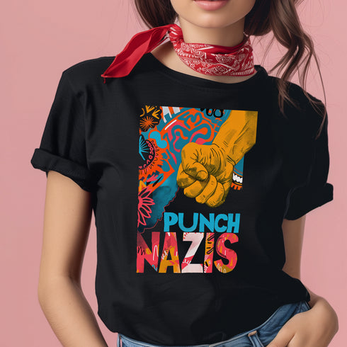 Black T-shirt featuring a bold, colorful "Punch Nazis" design with a clenched fist and abstract, graffiti-style patterns.